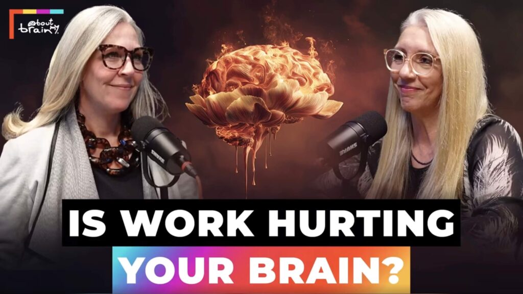 Angella Clarke-Jervoise Two women with long gray hair and glasses speak into microphones. Between them, an artistic brain image surrounded by flames captures the feeling of brain fatigue. Text below reads, “IS WORK HURTING YOUR BRAIN?” on a colorful background.